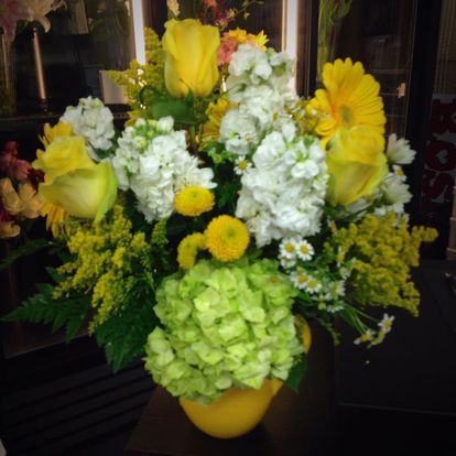 Yellow, white and green hydrangea arrangement