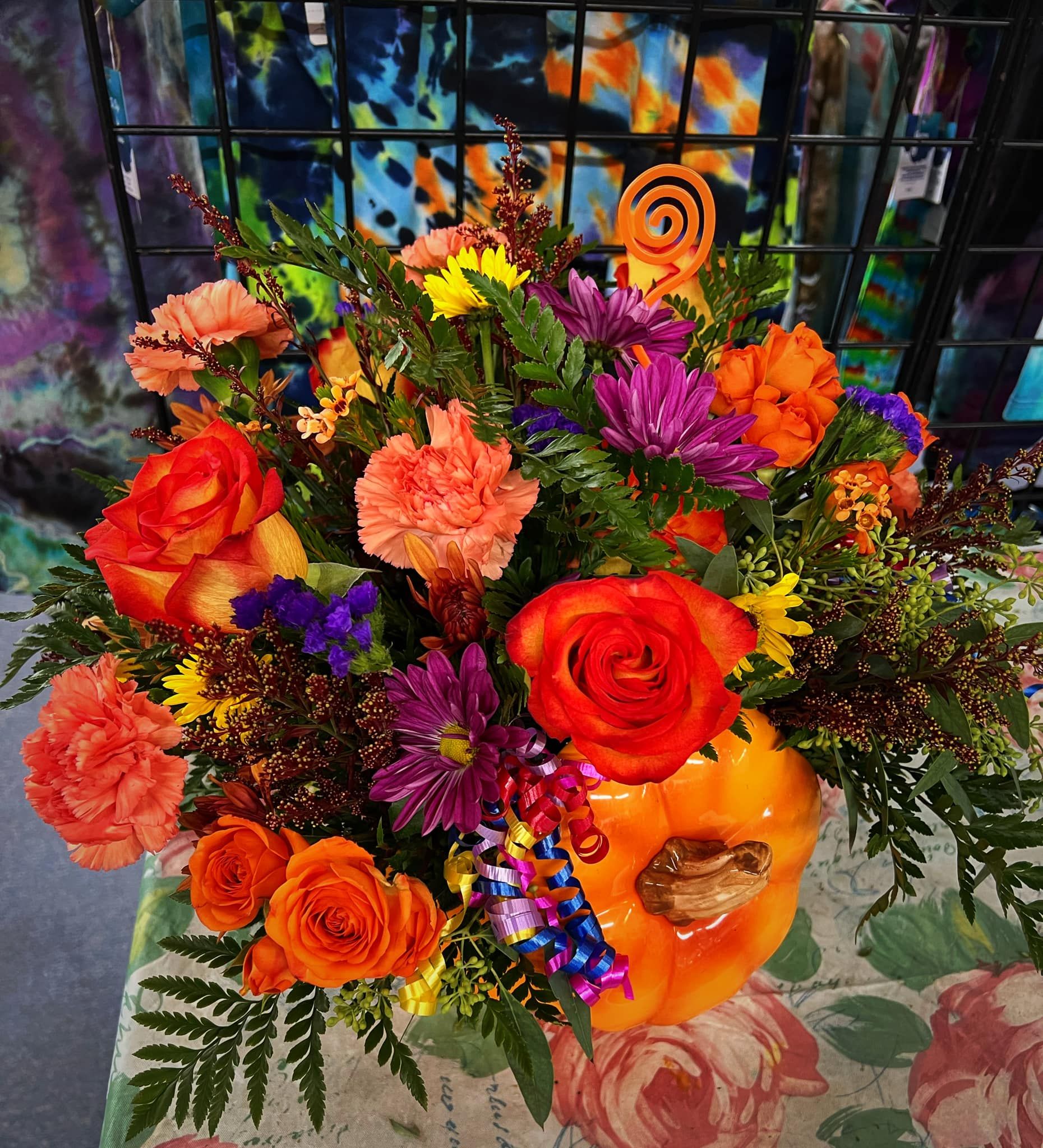 Orange roses and autumn flowers